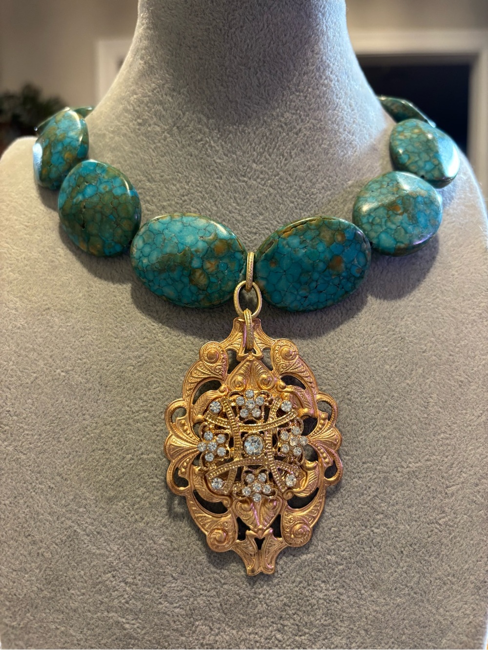 Turquoise colored chunky stone Bead Necklace with brass Ornate Pendant